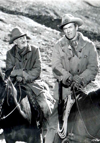 Walter Brennan as Ben Tatum and James Stewart as Jeff Webster in The Far Country (1954)