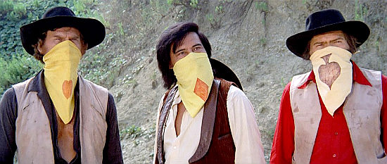 Donald O'Brien, George Wang and Ivan Greeve as the masked leaders of The Three Aces Gang in The Executioner of God (1973)