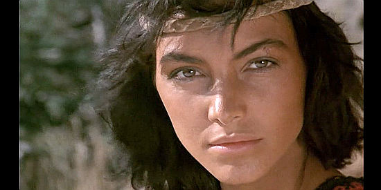 Mapi Galan as Yari in a mood for vengeance in Scalps (1987)