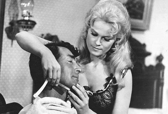 Dean Martin as Alex Flood gets a shave from Claire (Carol Andreson), his second favorite gal in Rough Night in Jericho (1967)
