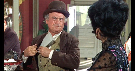 Dub Taylor as Doc Adams prepares to inspect Claire's girls in Death of a Gunfighter (1969)