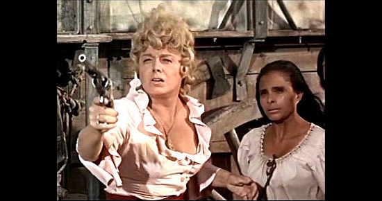 Shelley Winters as Kate prepares to defend her honor in The Scalphunters (1968)
