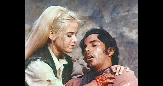 Sue Lyon as Myra Polsen with Julien Mateos as Fernando Nunez in Four Rode Out (1970)