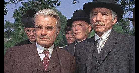 Town leaders Andrew Oxley (Kent Smith), the Rev. Rock (Harry Carey Jr.) and Ivan Stanek (Morgan Woodward) confront Frank Patch in Death of a Gunfighter (1969)