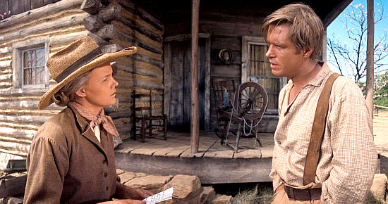 Carroll Baker as Eve Rawlings with her oldest son Zeb (George Peppard) in How the West Was Won (1962)