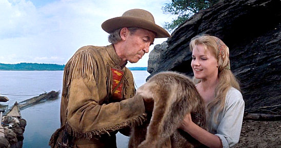 James Stewart as Linus Rawlings with Carroll Baker as Eve Prescott Rawlings in How the West Was Won (1962)