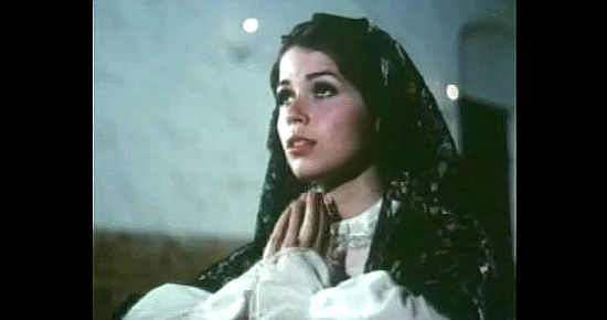 Maria Grimm as Maria Vargas, the dark-haired beauty who turns Ike's head in The Proud and the Damned (1972)