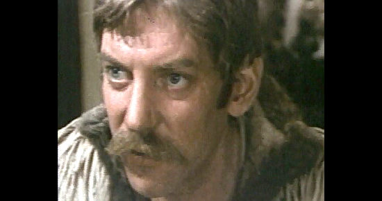 Donald Sutherland as Sgt. Dan Candy in Dan Candy's Law (1974) 