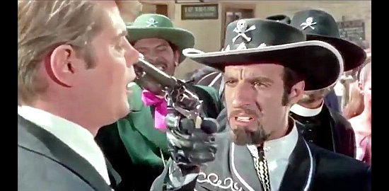 German Robles as Cold Steel with Phillip P. Philips at gunpoint in The Phantom Gunslinger (1970)