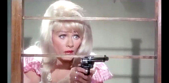 Sabrina as Margie Jones tries to prevent a bank robbery in The Phantom Gunslinger (1970)