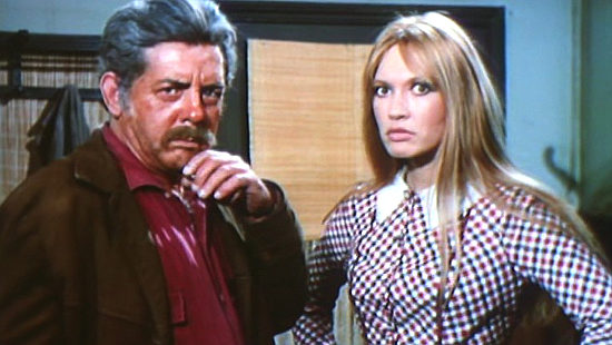 Sergio Dore as the Brownsville sheriff with niece Glenda Kelly (Gillian Hills) as they discuss poker and murder in Dallas (1974)