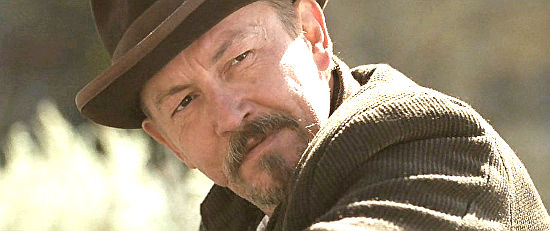 Tommy Flanagan as Tom Harrah is haunted by one of Jeremiah's Wild West stories in The Ballad of Lefty Brown (2017)