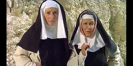 Franca Maresa (maybe) and Clara Colosimo as the other nuns in For a Book of Dollars (1973)
