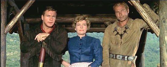 Gotz George as Fred Engle, Marianne Hoppe as Mrs. Butler and Lex Barker as Old Shatterhand ponder the fate of Patterson and his daughter in Treasure of Silver Lake (1962)