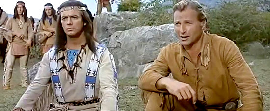 Pierre Brice as Winnetou and Lex Barker as Old Shatterhand during peace talks in Apache's Last Battle (1964)