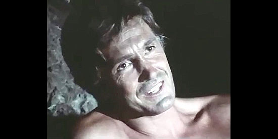 Giacomo Rossi Stuart (Jack Stuart) as Johnny MaGee reacts to finding a rich nugget in Thomas' mine in Kill Django ... Kill First (1970)
