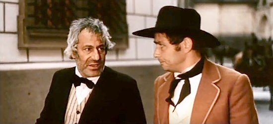 Grigory Lyampe as the Seller of Secrets with Vsevolod Abdulov as newspaperman Henry York in Armed and Dangerous (1978)
