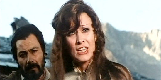Malisa Longo as Linda Burton, trying to prevent the branding of her son in White Fang and the Hunter (1974)
