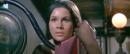 Virginia Darval as Dolores, prepared to fend off Vilar's advances in Killer Kid (1967)