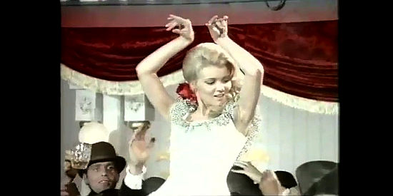Francoise Girault as Dolly launches into her striptease at Black Bird's saloon in Judge Roy Bean (1971)
