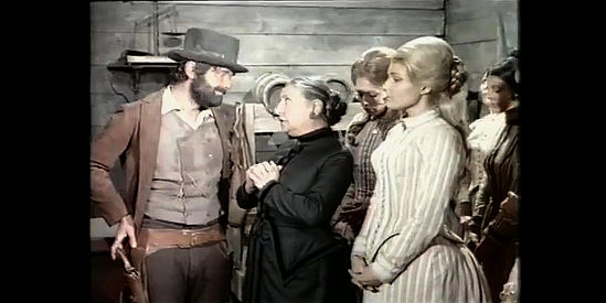 Paola Borboni as Victoria and Dolly (Francois Girault) offer Judge Bean (Pierre Perret) some feminine assistance in Judge Roy Bean (1971)