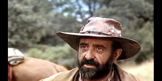 Ricardo Palacious as the whiskey salesman in Tex and the Lord of the Deep (1985)