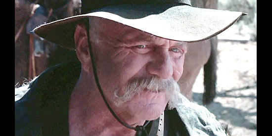 Brian Keith as Buckshot Roberts, a Murphy man turned bounty hunter in Young Guns (1988)