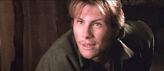 Christian Slater as Arkansas Dave Rudabaugh, hoping someone knows his name in Young Guns II (1990)