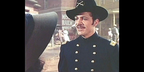 Dana Andrews as Maj. Tom Crail, enjoying a reunion with Belle in Belle Starr (1941)