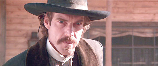 Dennis Quaid as Doc Holliday at the OK Corral in Wyatt Earp (1994)