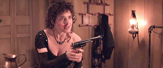 Isabella Rossellini as Big Nose Kate, Doc's girl, in Wyatt Earp (1994)
