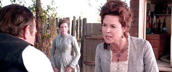 JoBeth Williams as Bessie Earp, James' wife in Wyatt Earp (1994)