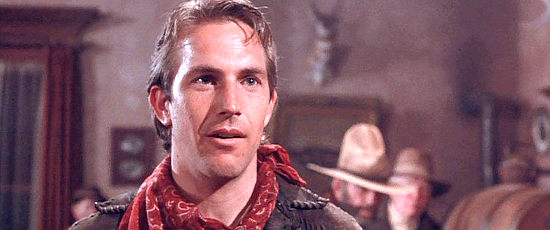 Kevin Costner as Jake, Emmett's younger brother in Silverado (1985)