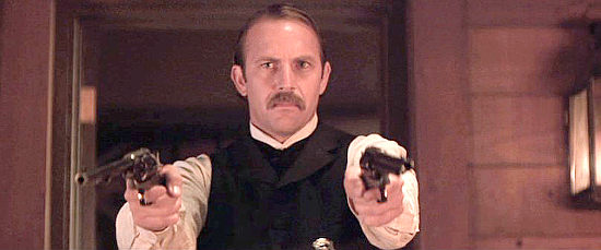 Kevin Costner as Wyatt Earp, facing down a lynch mob, in Wyatt Earp (1994)