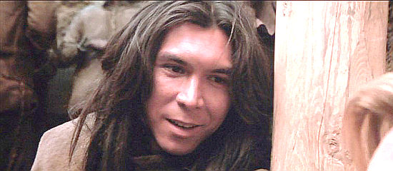 Lou Diamond Phillips as Chavez y Chavez, hoping for rescue from the pit in Young Guns II (1990)