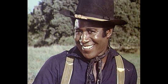Robert DoQui as Eli Brown, a new recruit in the 10th Cavalry in The Red, White and Black (1970)