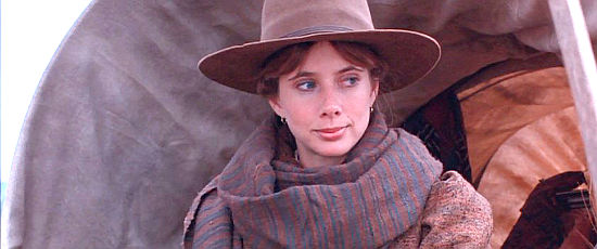 Rosanna Arquette as Hannah, determined to start a farm out West in Silverado (1985) 