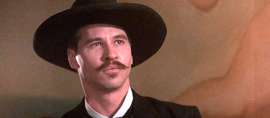 Val Kilmer as Doc Holliday, ready to face death at any time, in Tombstone (1993)