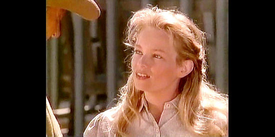 Amy Stock Poynton as Beth Riordan, presenting her dad with a shotgun for his birthday in Gunsmoke, One Man's Justice (1994)