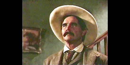 Buck Taylor as Newly O'Brien, new marshal of Dodge City in Gunsmoke, Return to Dodge (1987)