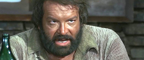 Bud Spencer as Bambino, a horse thief posing as sheriff in They Call Me Trinity (1970) 