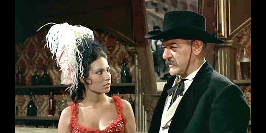Carla Petrillo as saloon girl Linda agrees to do some undercover work for Lash Bogart (Livio Lorenson) in The Winchester Does Not Forgive (1967)