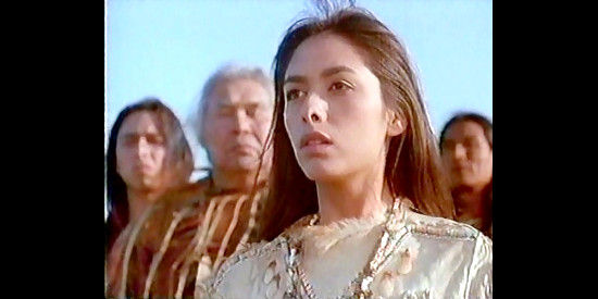 Carmen Moore as Chewlynndit, watching Ethan fight a Seneca warrior for her hand in Brothers of the Frontier (1996)