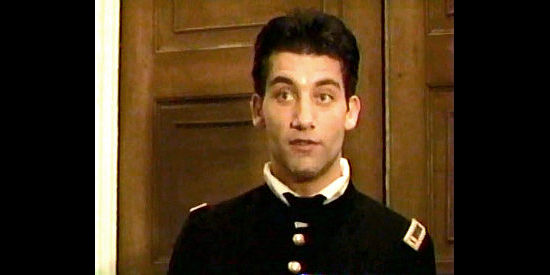 Clive Owen as Devin O'Neil, the Northern lad struggling to get a war assignment in Class of '61 (1993)