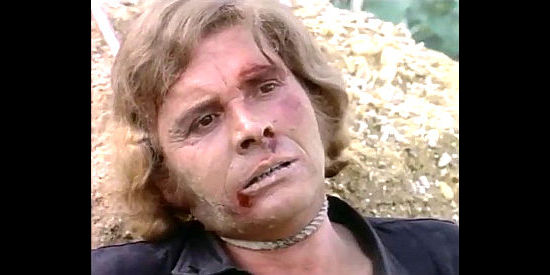 DIno Strano (Dean Stratford) finds himself all tied up in His Colt, Himself, His Revenge (1973)