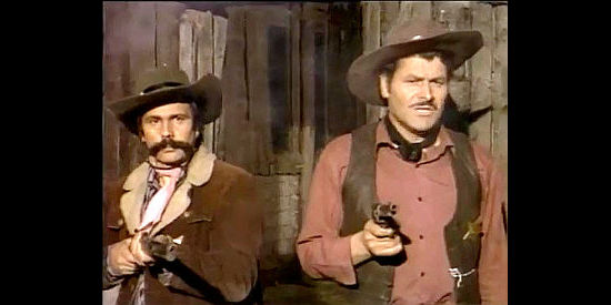 Gino Turini (John Braum) as Sheriff Ryan (right) with one of his deputies in His Colt, Himself, His Revenge (1973)