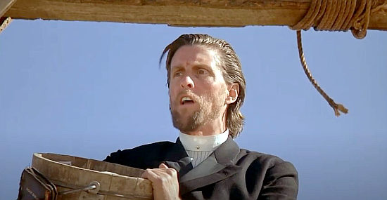 John Glover as The Preacher. accepting donations in return for a hanging show in El Diablo (1990)