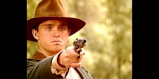Kelly Morgan as Lucas Miller, practicing his six-gun skills for when he meets his mother's killers in Gunsmoke, One Man's Justice (1994)