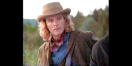 Michael Cram as Ned Holcomb, the more reasonable of the Holcomb brothers in Brothers of the Frontier (1996)