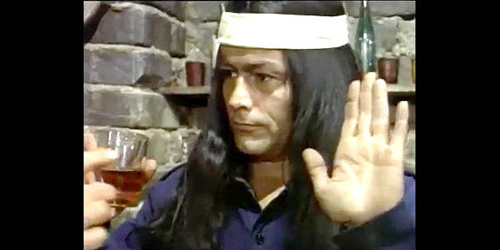 Michael O'Donahue (Mike Monty) as Macha, the Indian member of the outlaw gang in His Colt, Himself, His Revenge (1973)